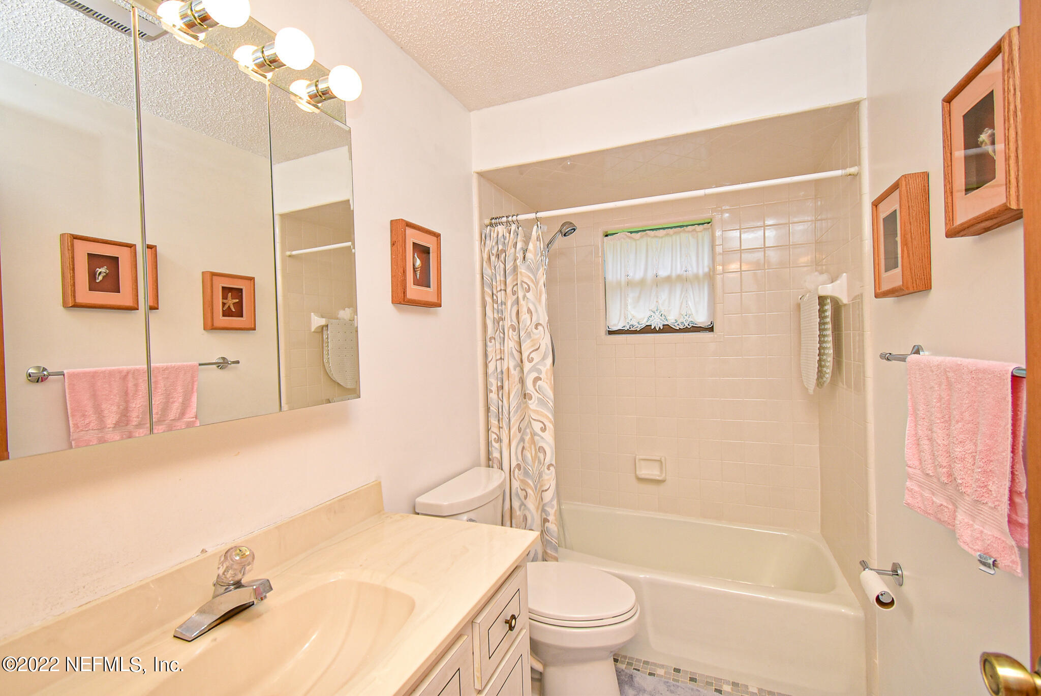 105 Tallow Road Pomona Park, FL 32181 - Photo 36 of 55 a bathroom with a sink toilet and shower
