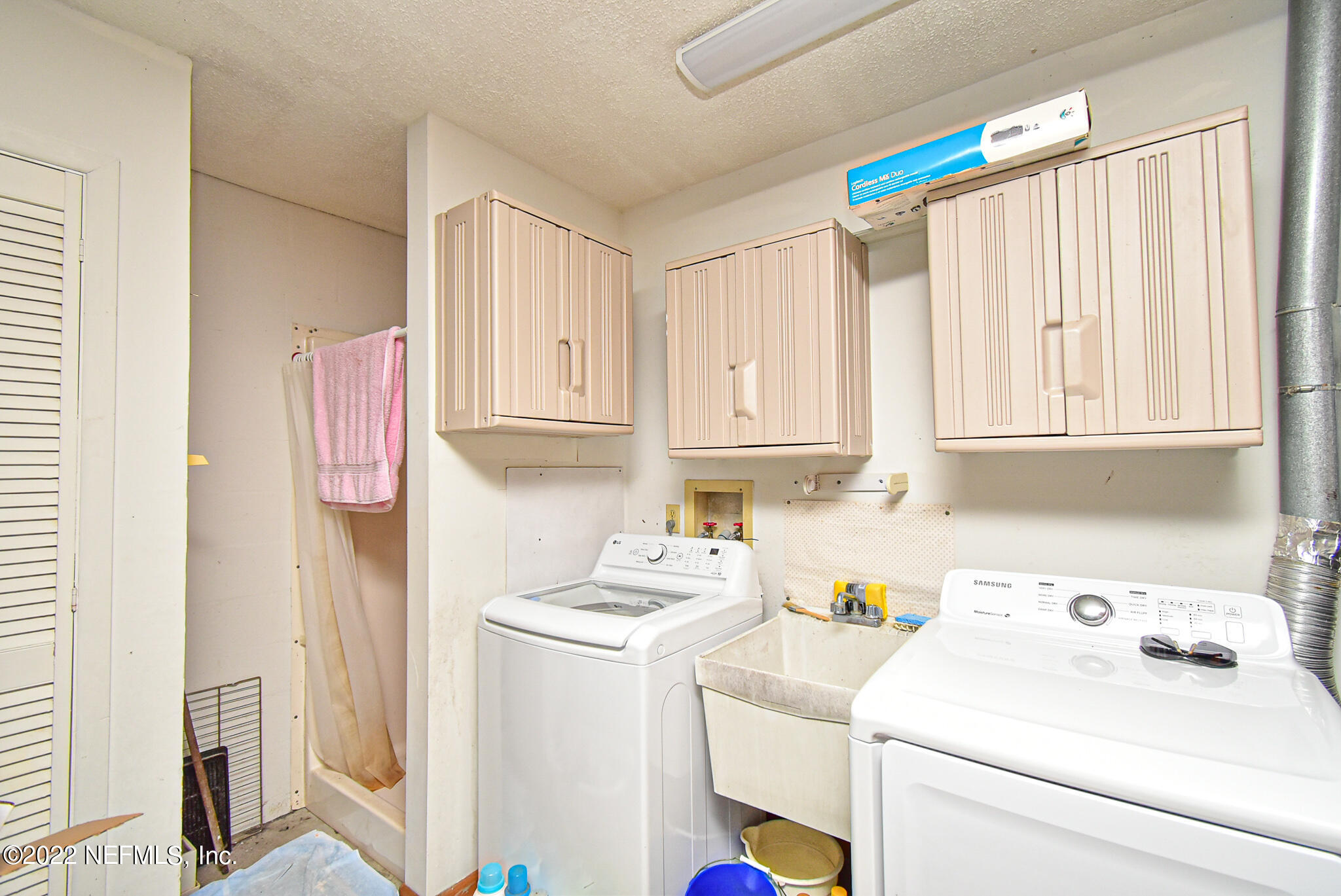 105 Tallow Road Pomona Park, FL 32181 - Photo 39 of 55 a room with storage and utility