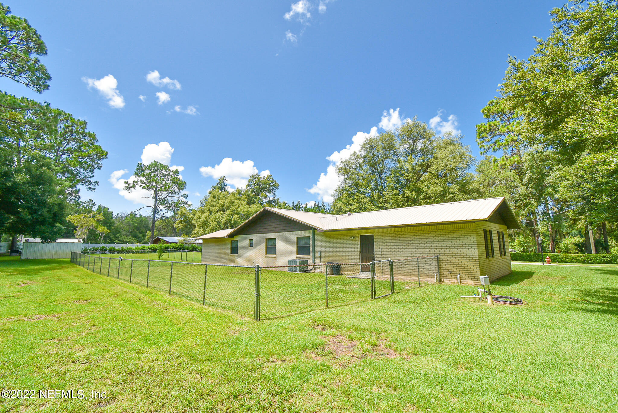 105 Tallow Road Pomona Park, FL 32181 - Photo 43 of 55 a house view with a garden space