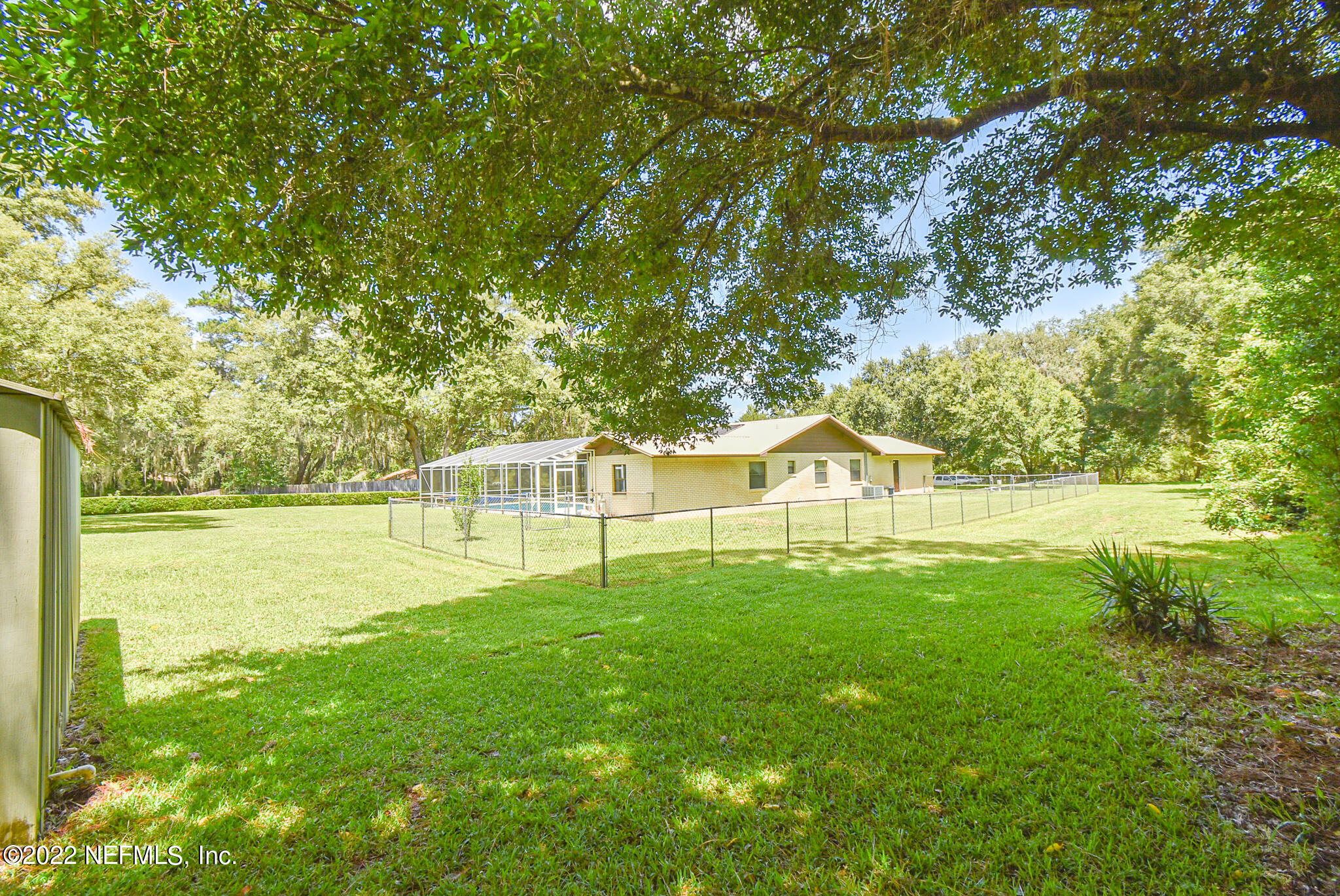 105 Tallow Road Pomona Park, FL 32181 - Photo 45 of 55 a front view of a house with yard and green space