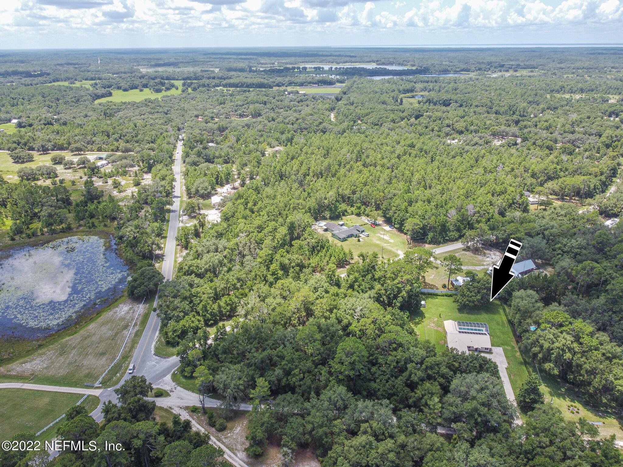 105 Tallow Road Pomona Park, FL 32181 - Photo 52 of 55 a view of a field with an ocean
