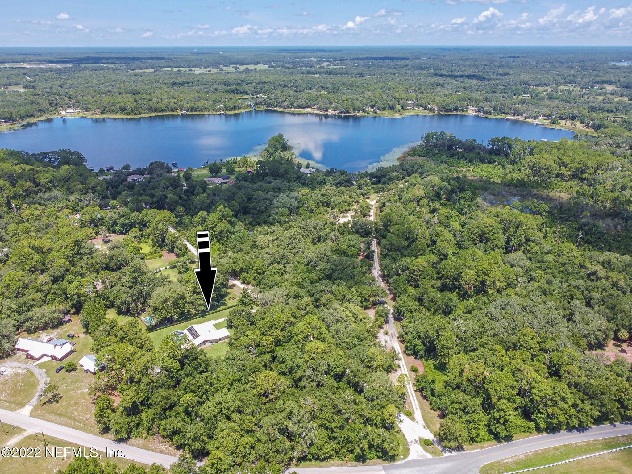 105 Tallow Road Pomona Park, FL 32181 - Photo 7 of 55 a view of lake with mountain
