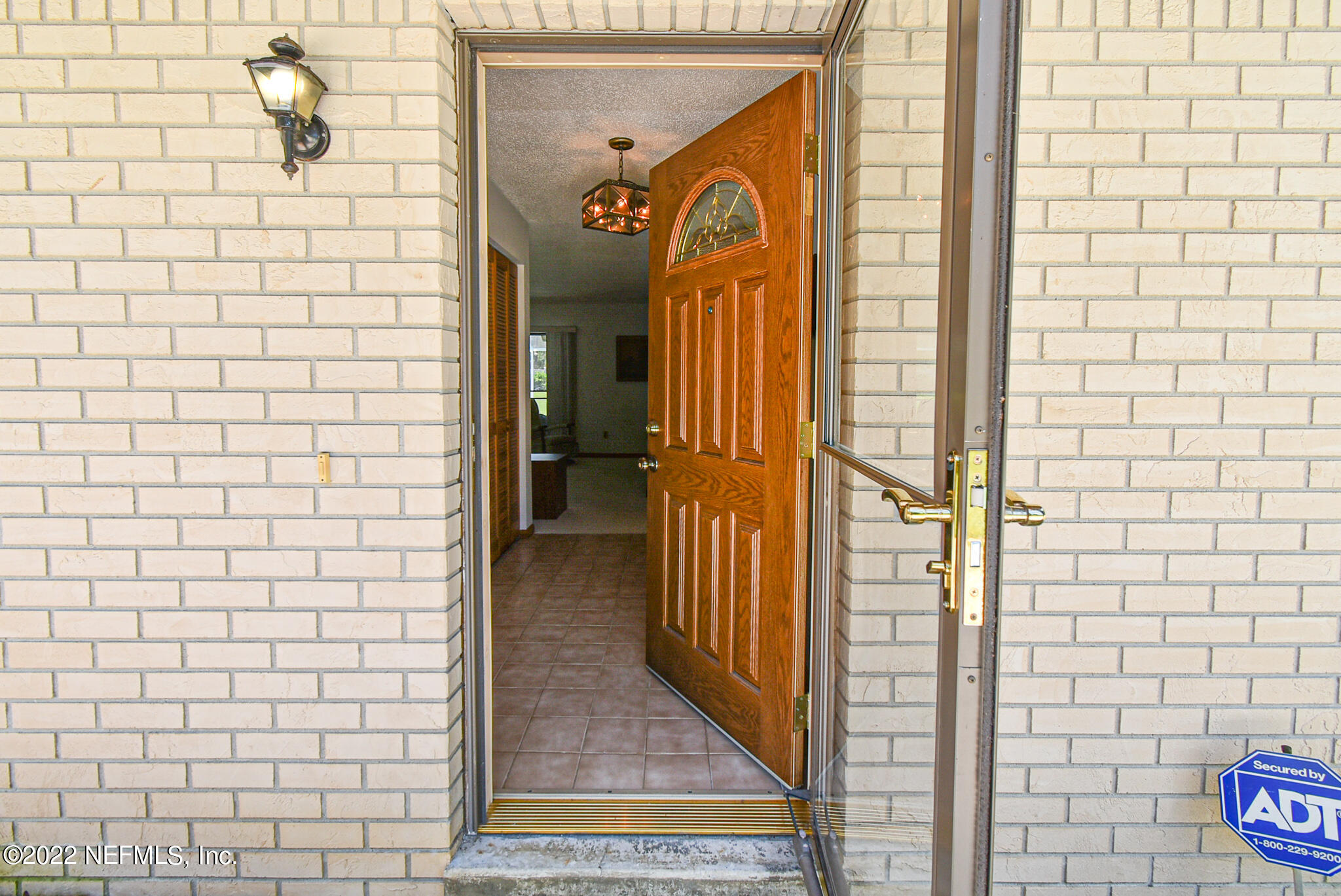 105 Tallow Road Pomona Park, FL 32181 - Photo 10 of 55 a view of a door and brick walls