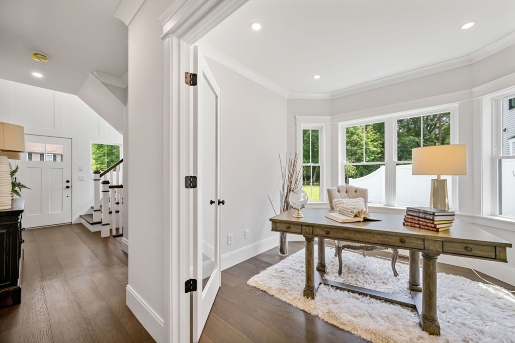 5 Milk Street Natick, MA 01760 - Photo 14 of 36 a workspace with furniture and a wooden floor