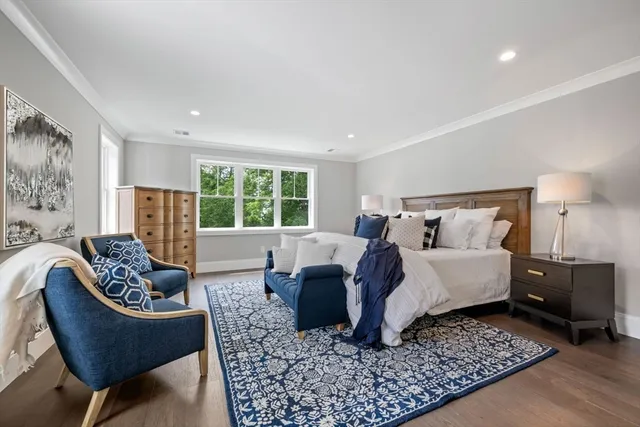 a living room with furniture rug and window