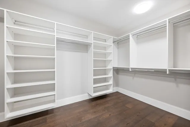 a view of an empty walk in closet