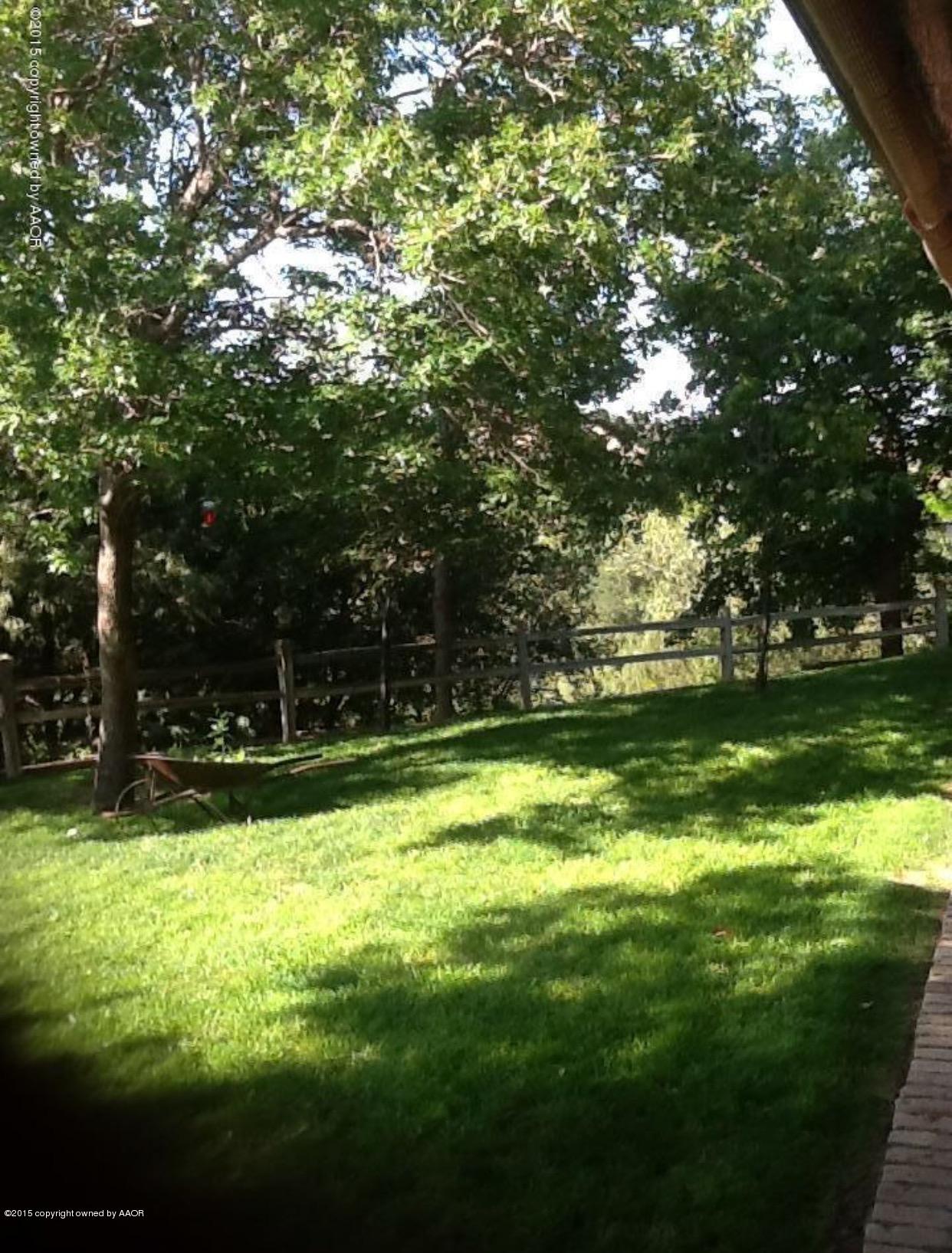 525 Fox Ridge Road Amarillo, TX 79118 - Photo 3 of 29 a view of a trees in a yard