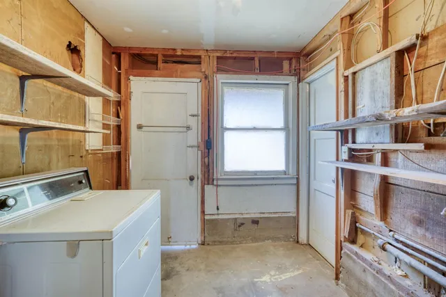 a room with storage and utility