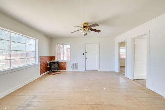 a view of livingroom with furniture and a window