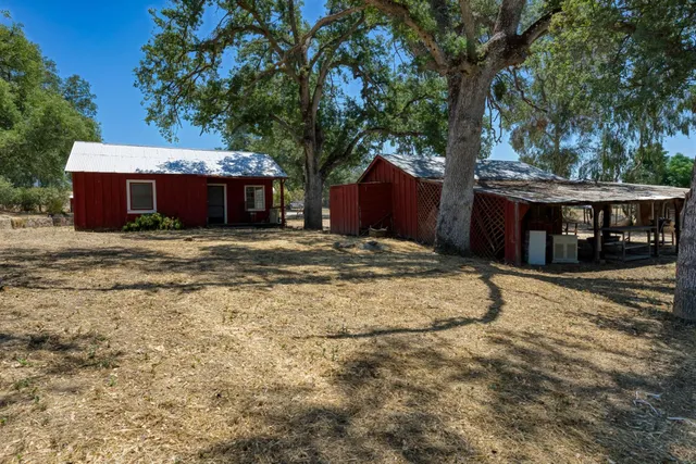 a house with trees in front of it