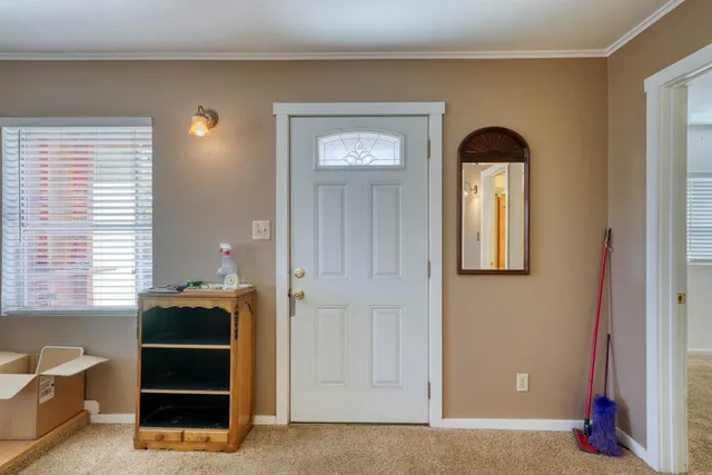 a room with window and closet