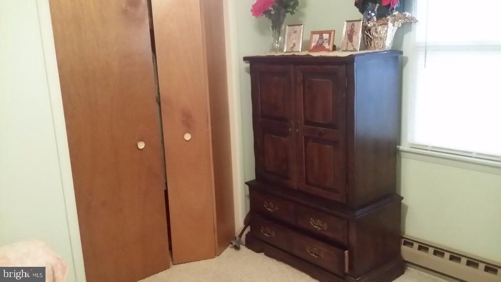 18 A Sycamore Access Road, Unit 5B Manahawkin, NJ 08050 - Photo 12 of 19 a room with a dresser