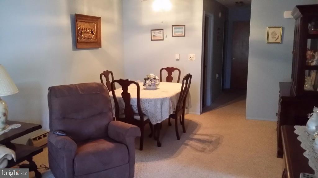 18 A Sycamore Access Road, Unit 5B Manahawkin, NJ 08050 - Photo 3 of 19 a view of a livingroom with furniture and a couch