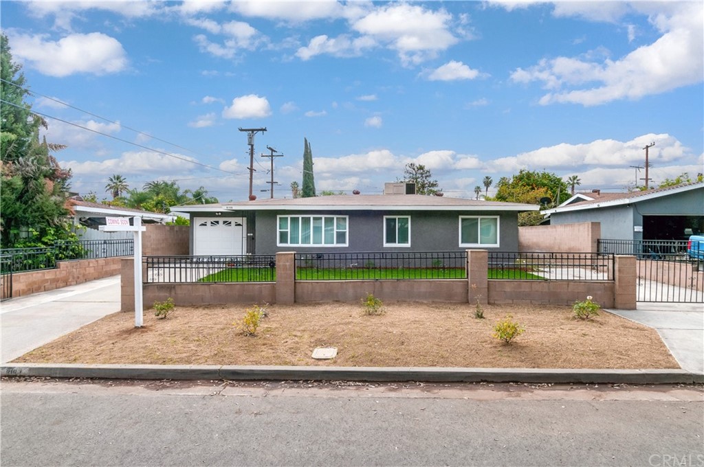8198 Marie Street Riverside, CA 92504 - Photo 1 of 1 a view of a house with a swimming pool