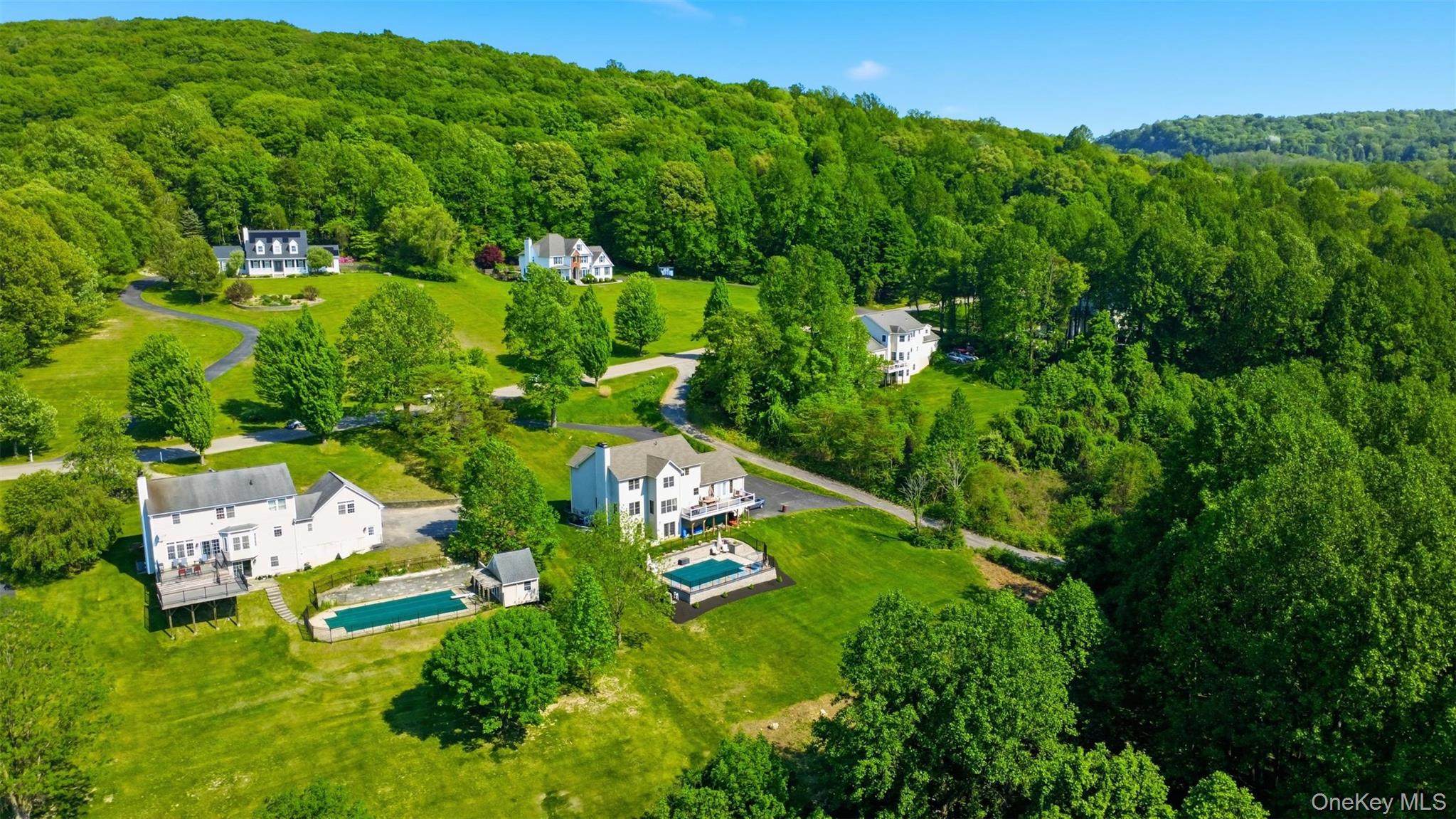 233 Devon Farms Road Stormville, NY 12582 - Photo 45 of 48 an aerial view of a house with a yard