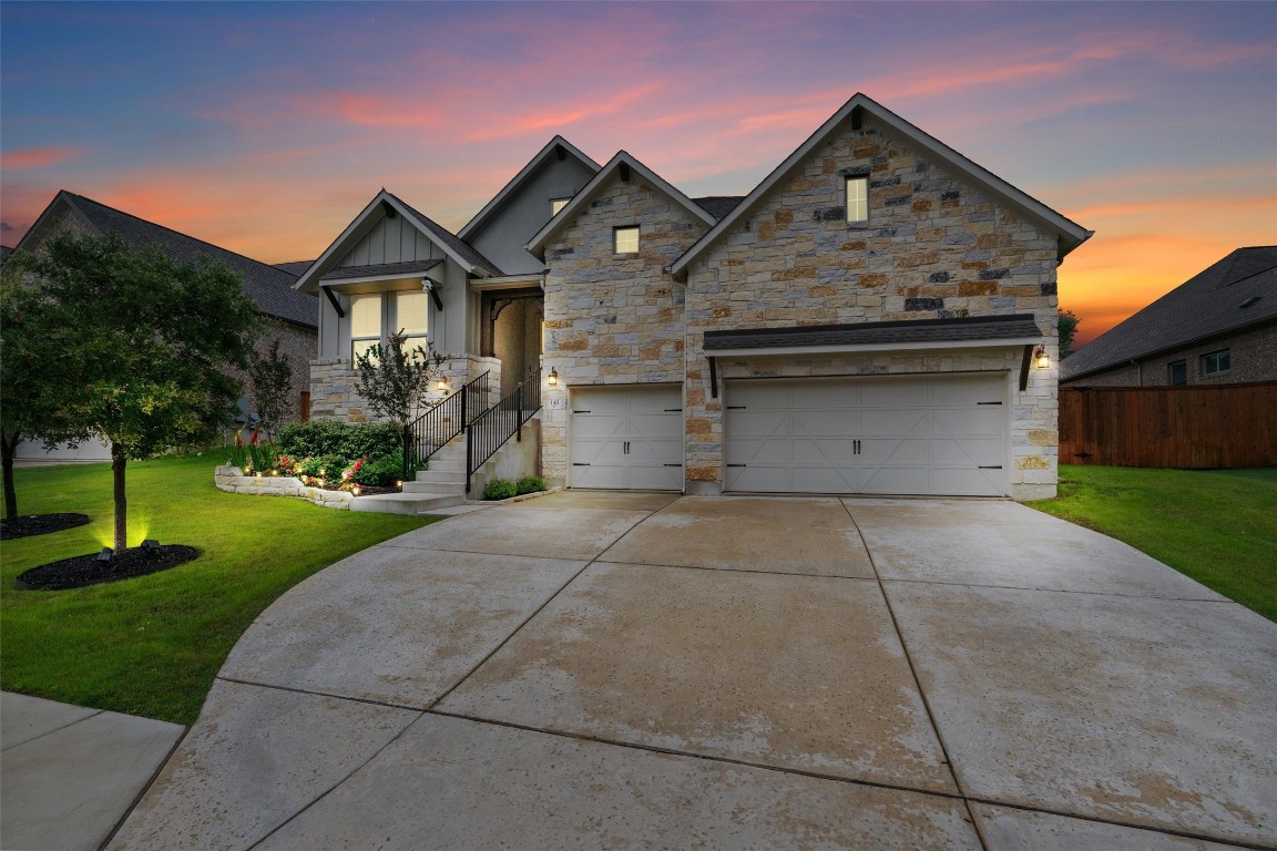 141 Lake Spring Circle Georgetown, TX 78633 - Photo 1 of 1 a front view of a house with a yard and garage