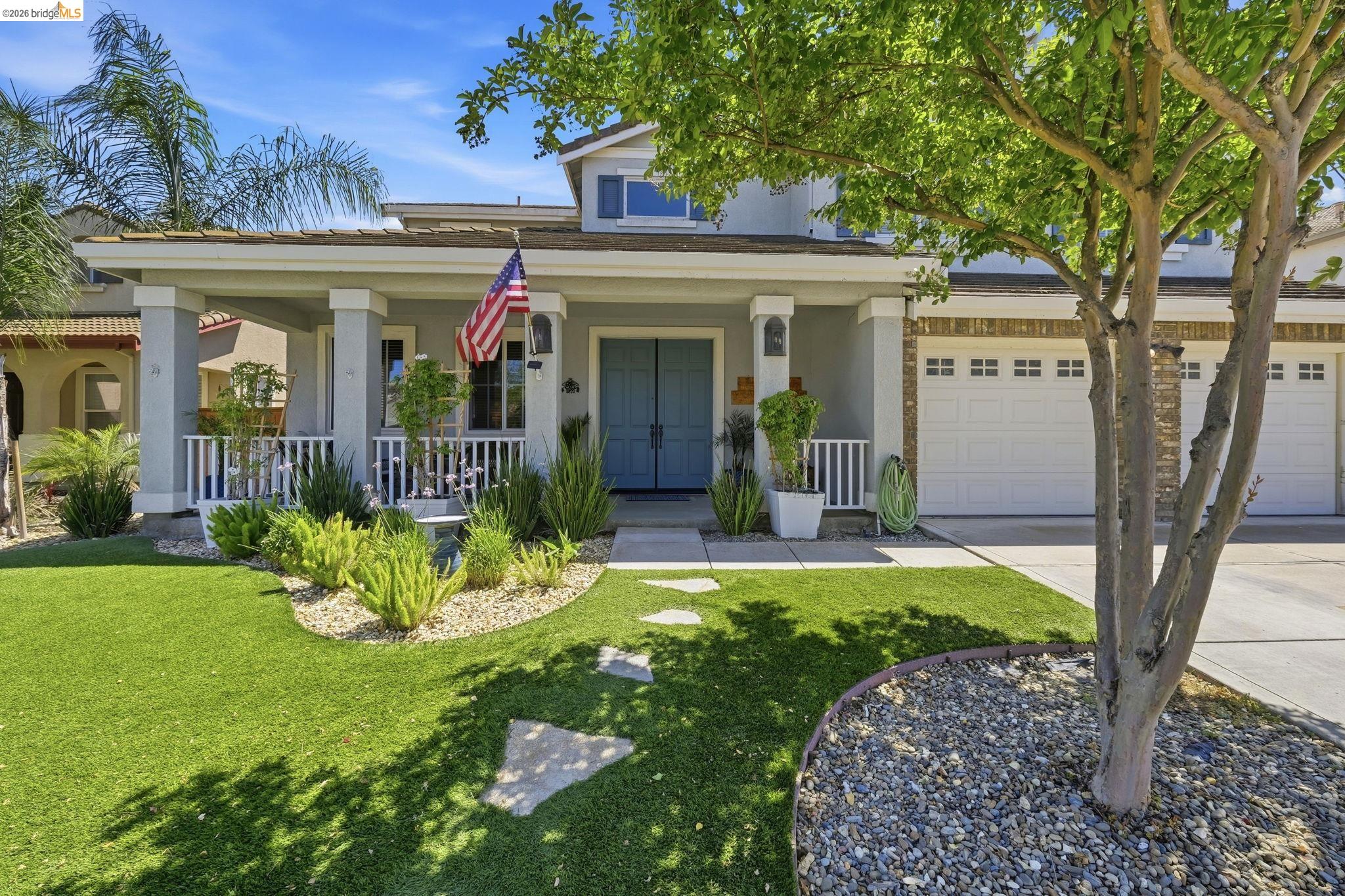 3438 Keystone Loop Discovery Bay, CA 94505 - Photo 4 of 57 a view of a house with garden