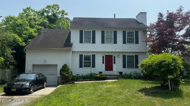 a view of a yard in front of house