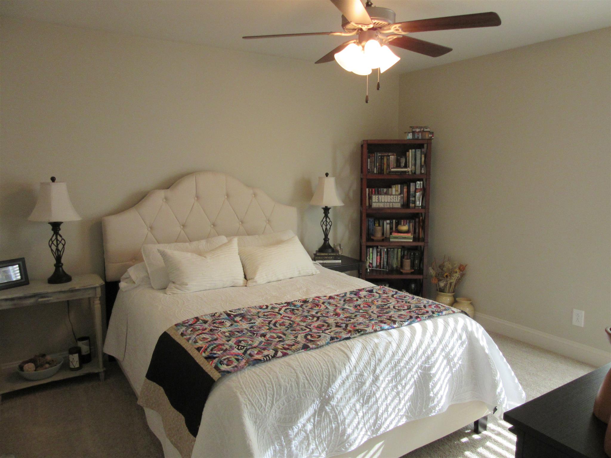 1791 Martins Chapel Church Road Springfield, TN 37172 - Photo 16 of 24 a bedroom with a bed and a chandelier