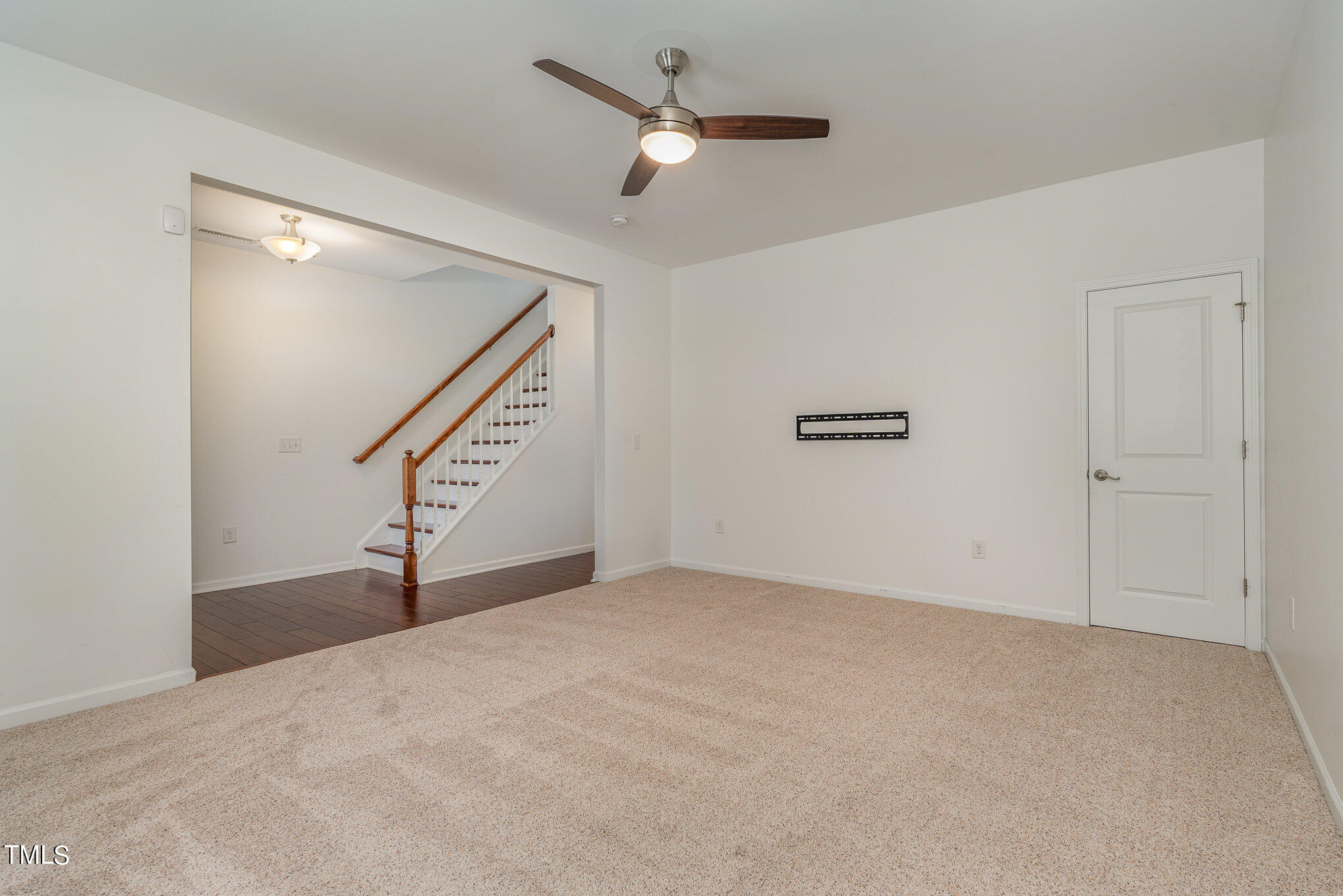 1435 Van Page Boulevard Raleigh, NC 27607 - Photo 12 of 41 a view of an empty room with a ceiling fan