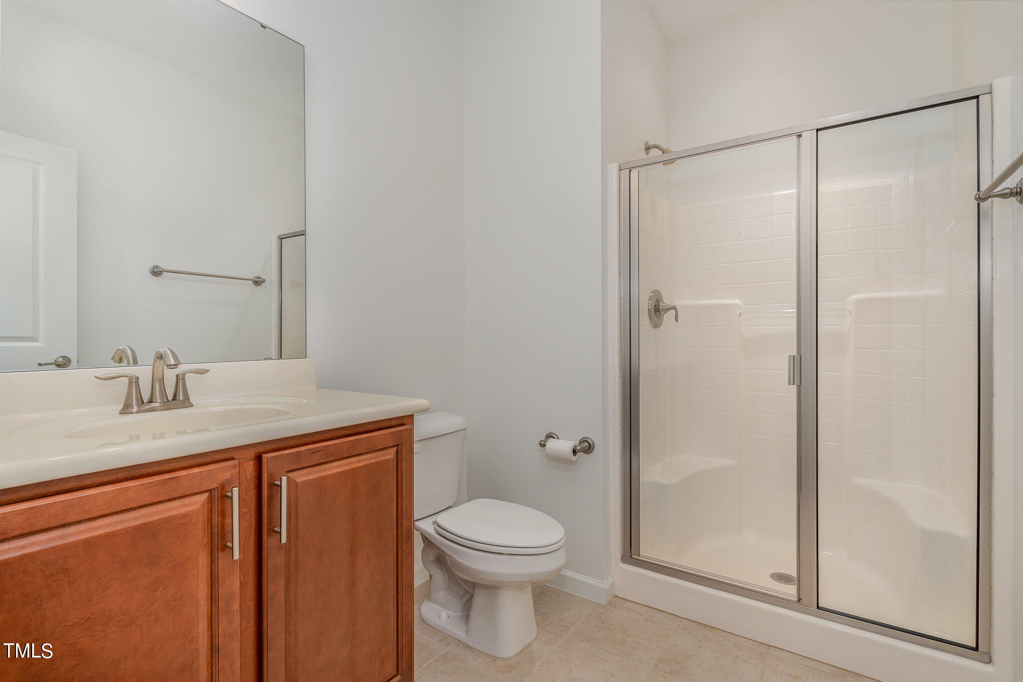 1435 Van Page Boulevard Raleigh, NC 27607 - Photo 13 of 41 a bathroom with a granite countertop sink toilet and shower