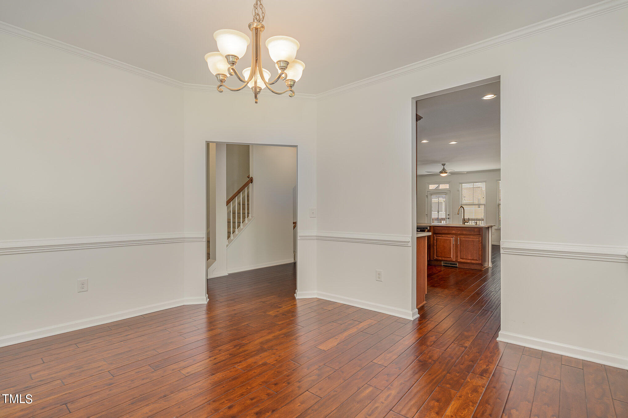 1435 Van Page Boulevard Raleigh, NC 27607 - Photo 16 of 41 a view of a livingroom with wooden floor