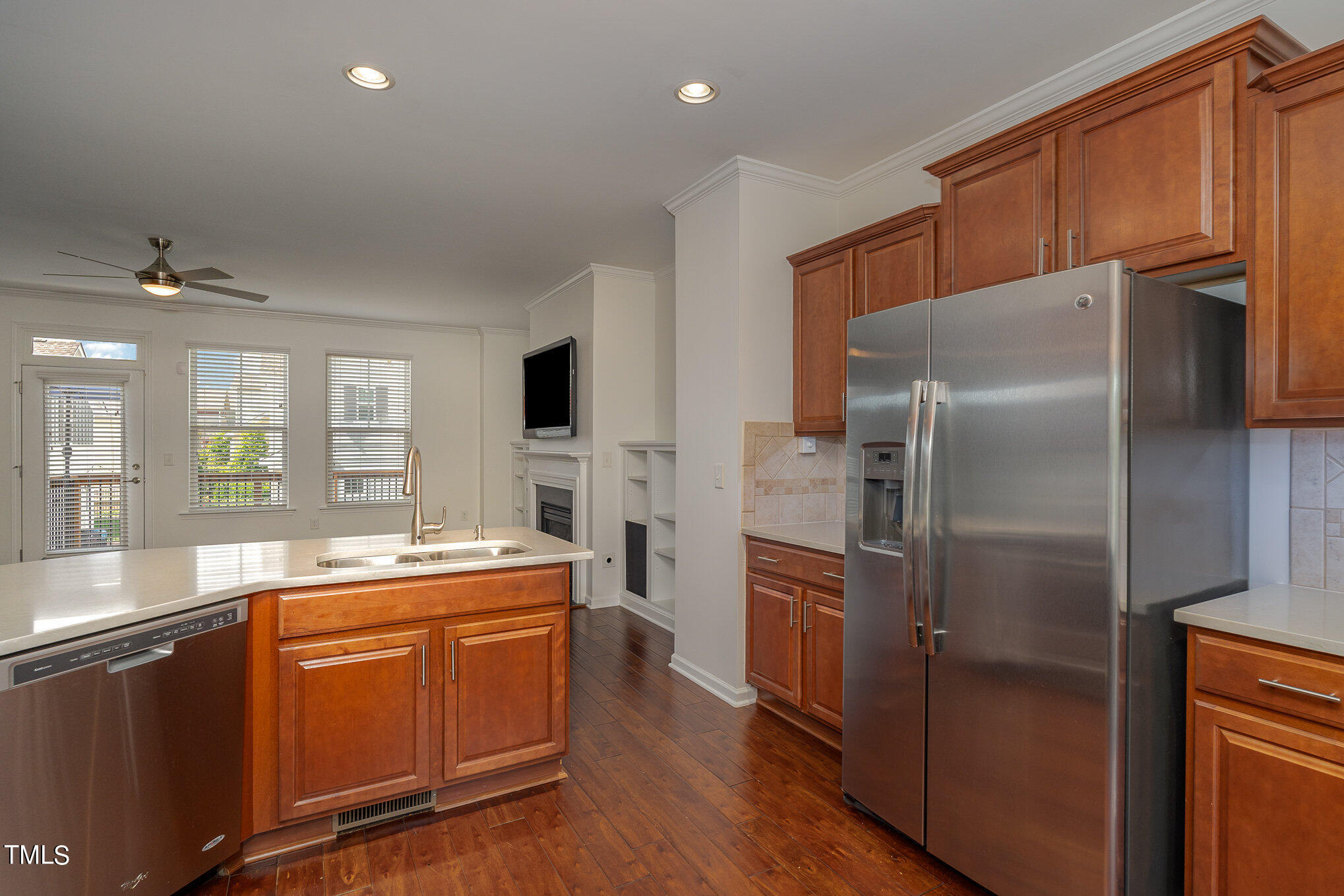 1435 Van Page Boulevard Raleigh, NC 27607 - Photo 19 of 41 a kitchen with stainless steel appliances a refrigerator sink and microwave