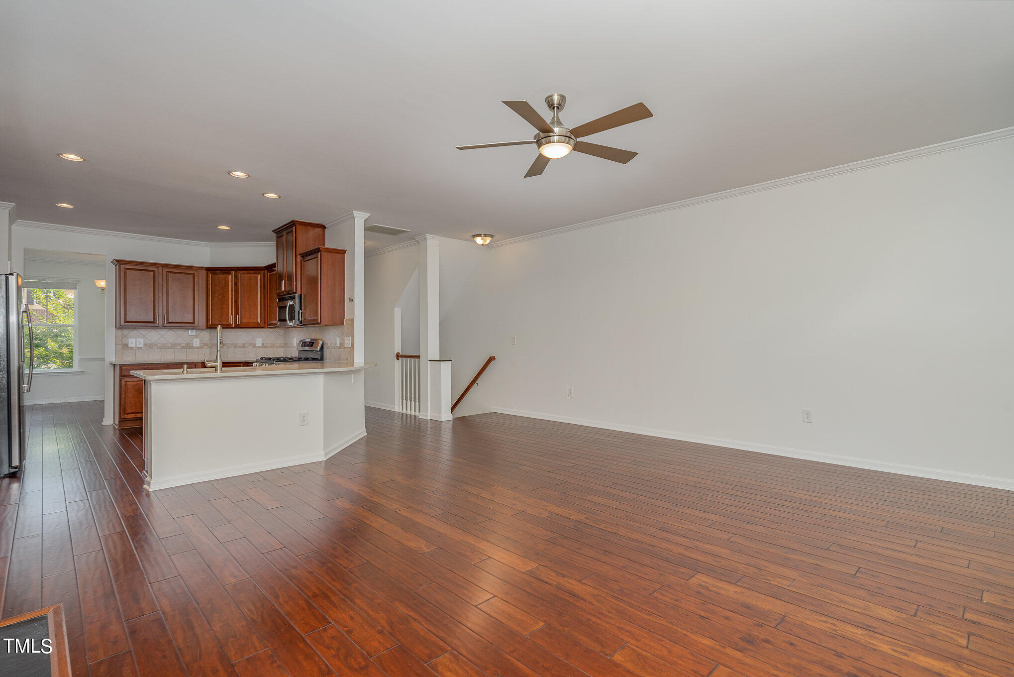 1435 Van Page Boulevard Raleigh, NC 27607 - Photo 20 of 41 a view of kitchen with cabinets and wooden floor