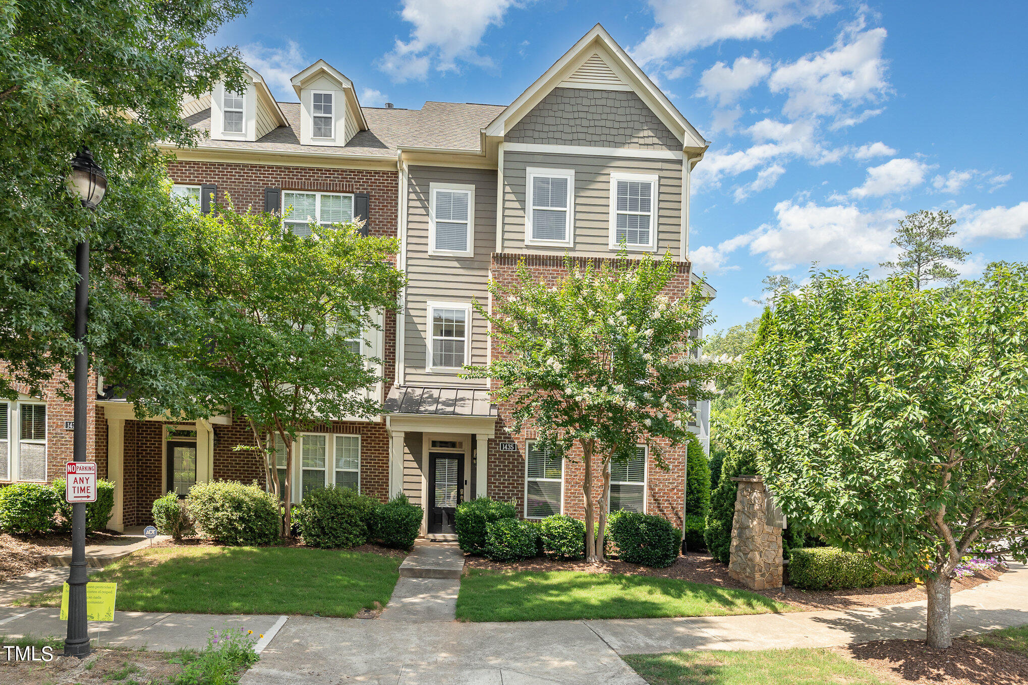 1435 Van Page Boulevard Raleigh, NC 27607 - Photo 2 of 41 a front view of a house with garden