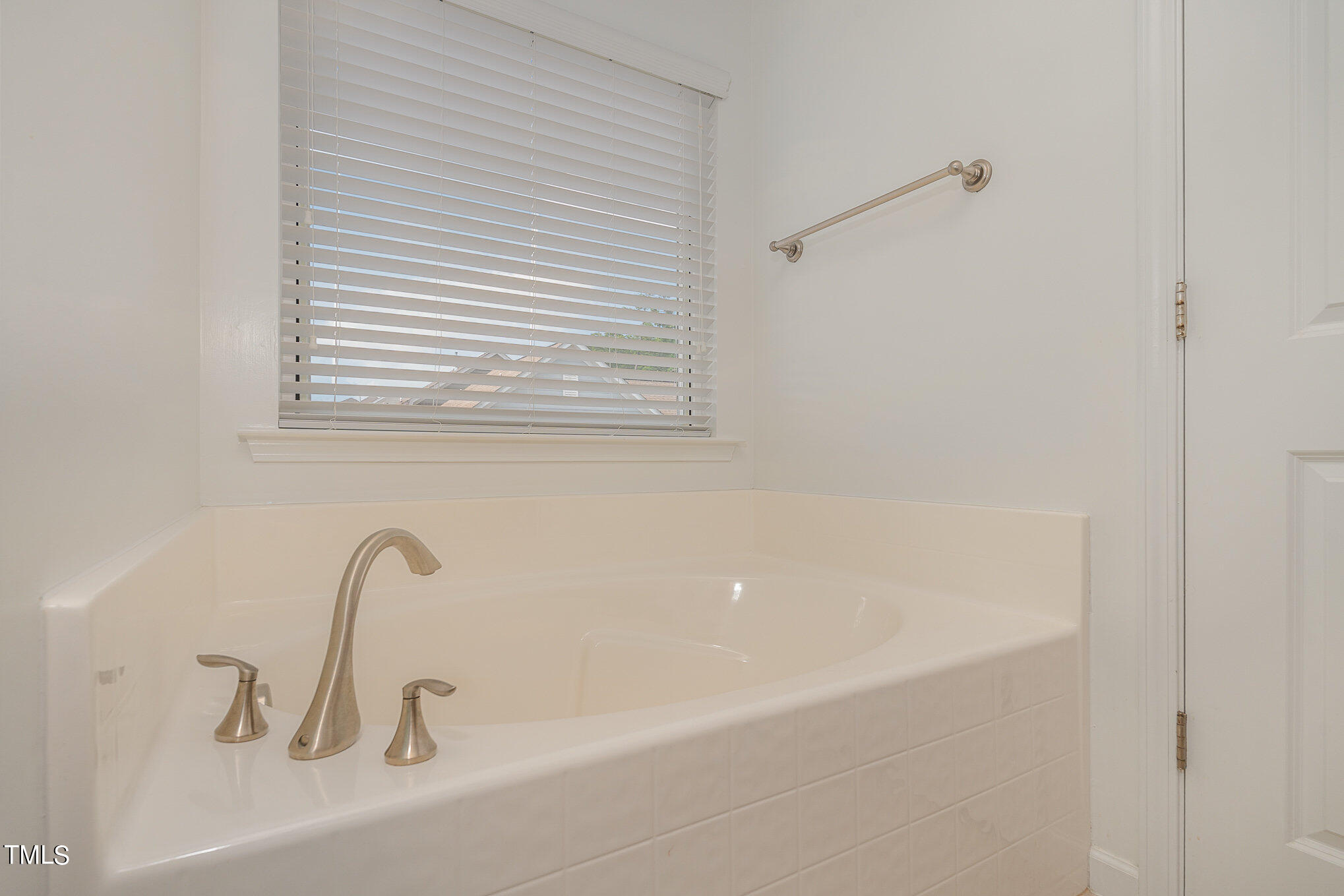 1435 Van Page Boulevard Raleigh, NC 27607 - Photo 29 of 41 a bathroom with a bathtub