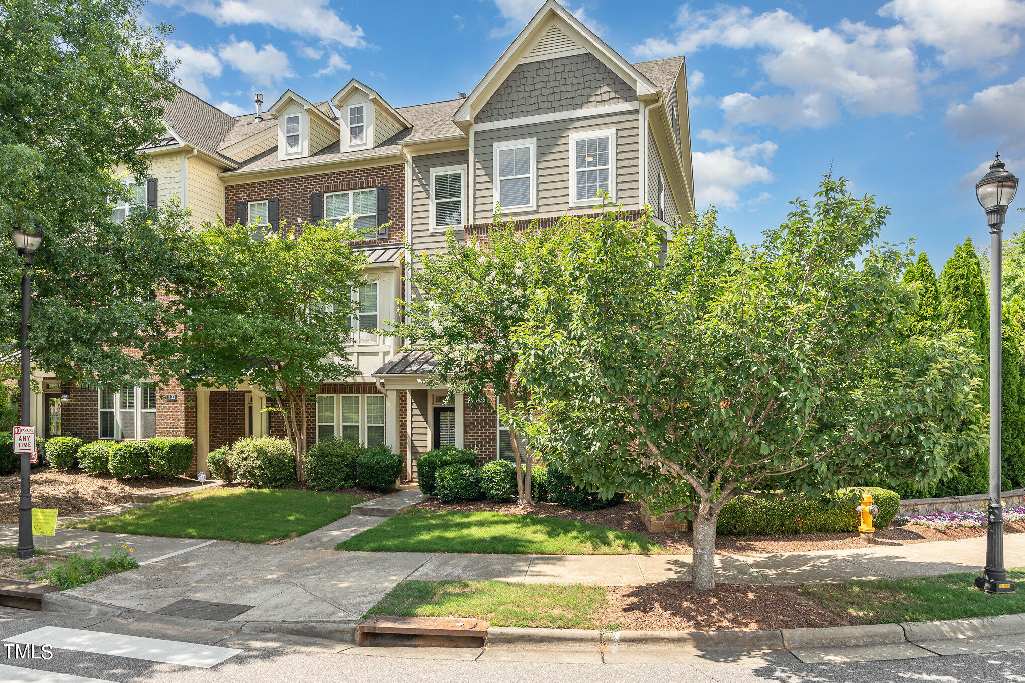 1435 Van Page Boulevard Raleigh, NC 27607 - Photo 3 of 41 a front view of a house with a yard