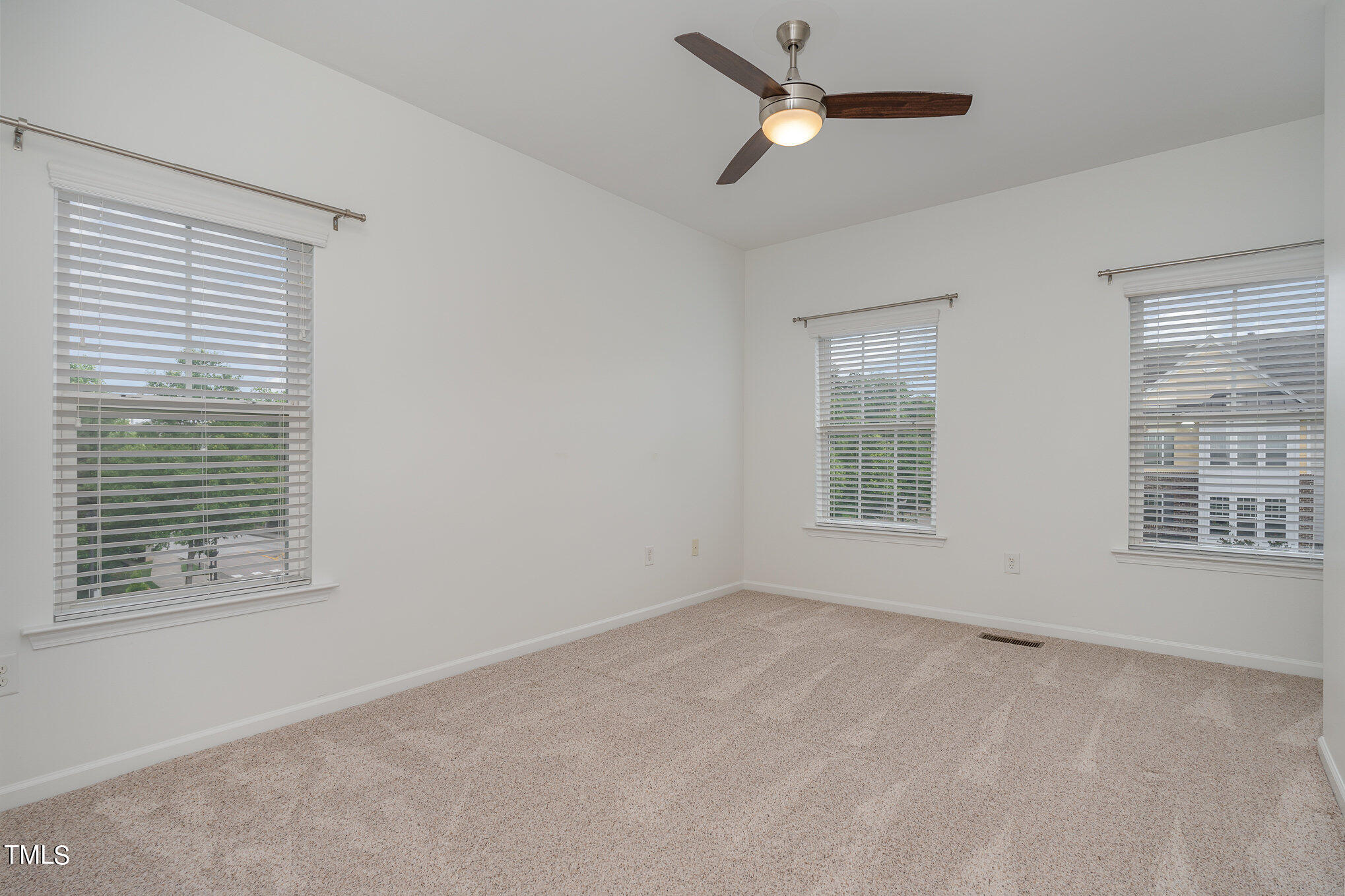 1435 Van Page Boulevard Raleigh, NC 27607 - Photo 31 of 41 a view of an empty room with a window