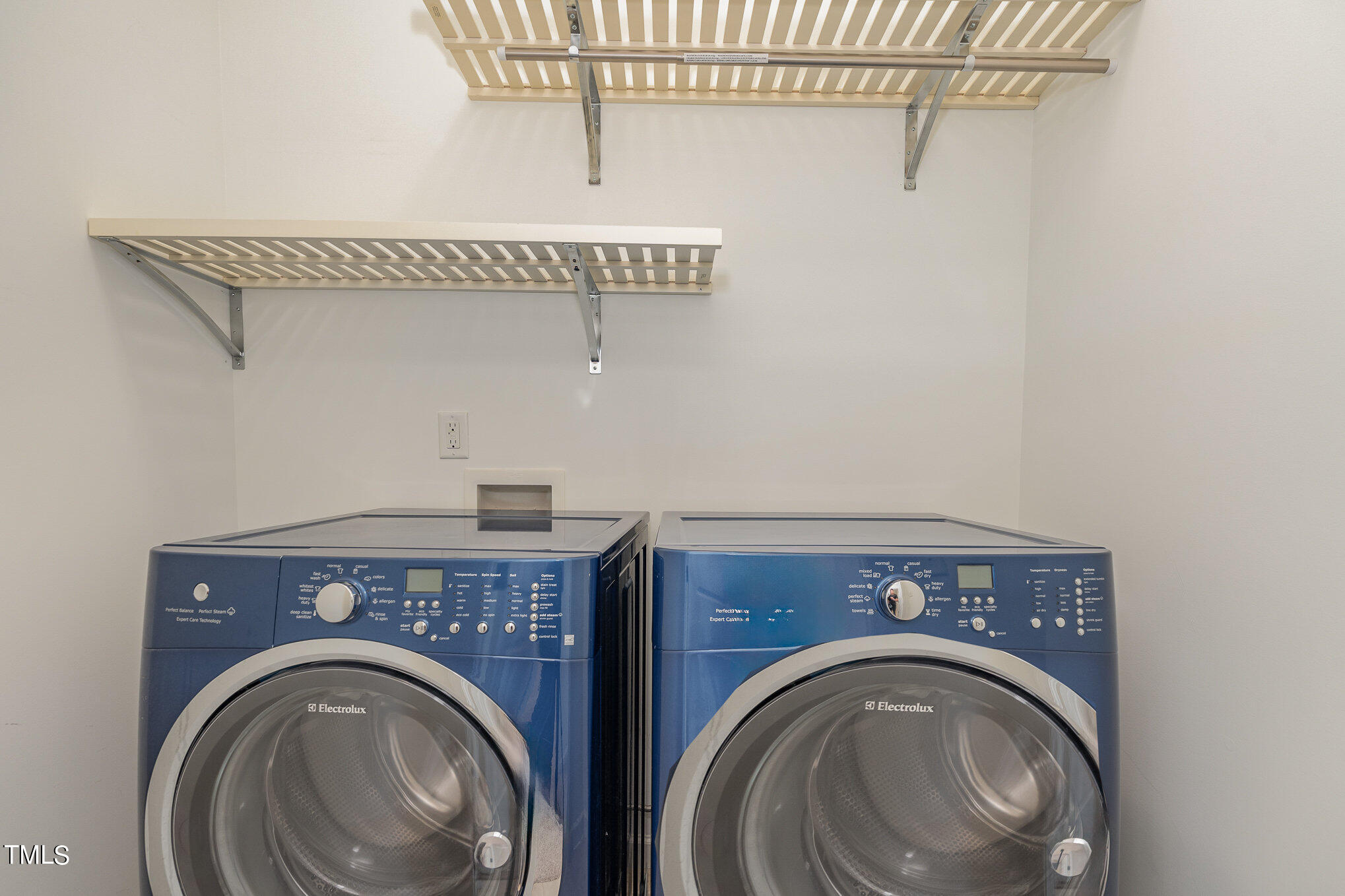 1435 Van Page Boulevard Raleigh, NC 27607 - Photo 36 of 41 a view of storage and utility room with washer and dryer