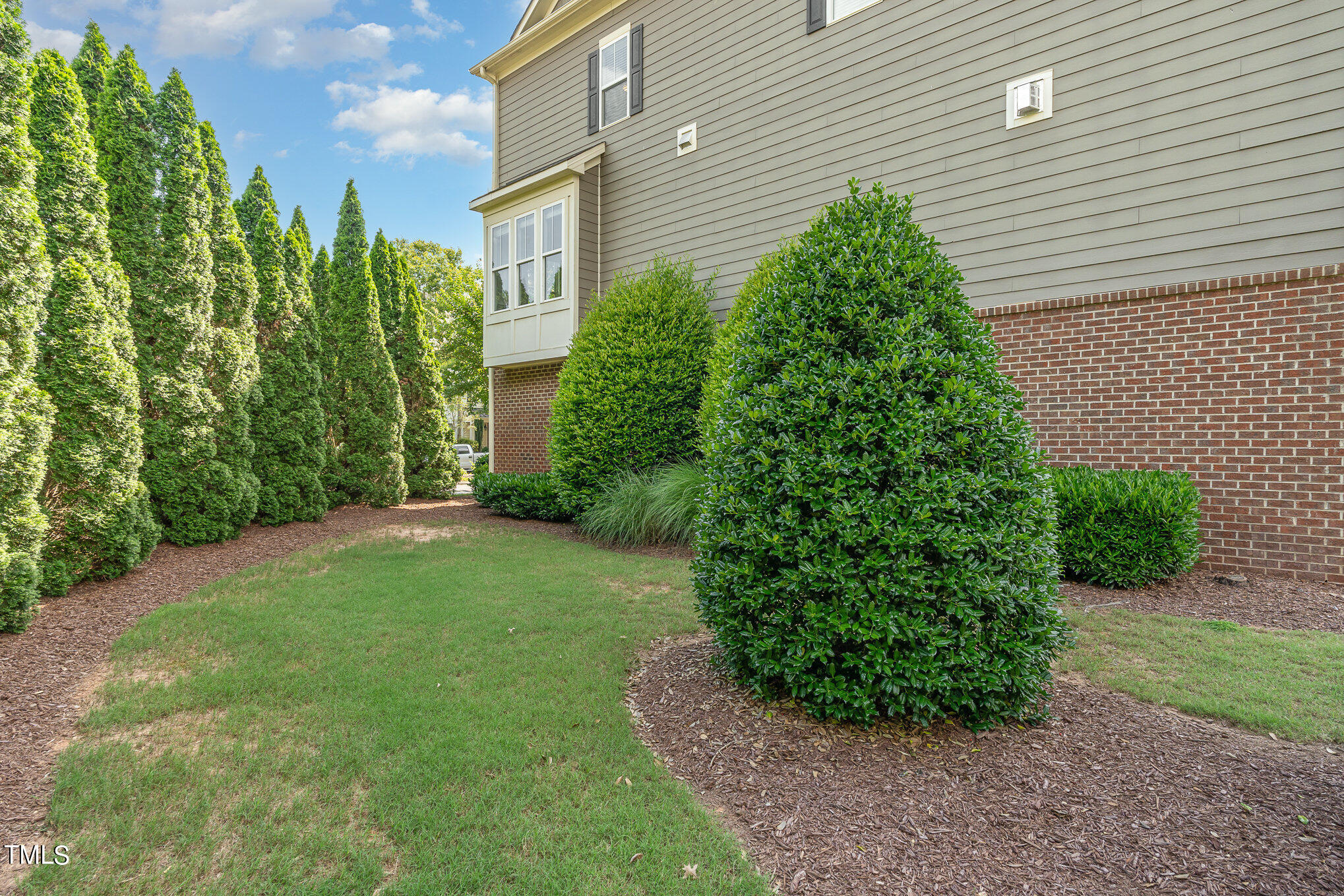 1435 Van Page Boulevard Raleigh, NC 27607 - Photo 4 of 41 a backyard of a house