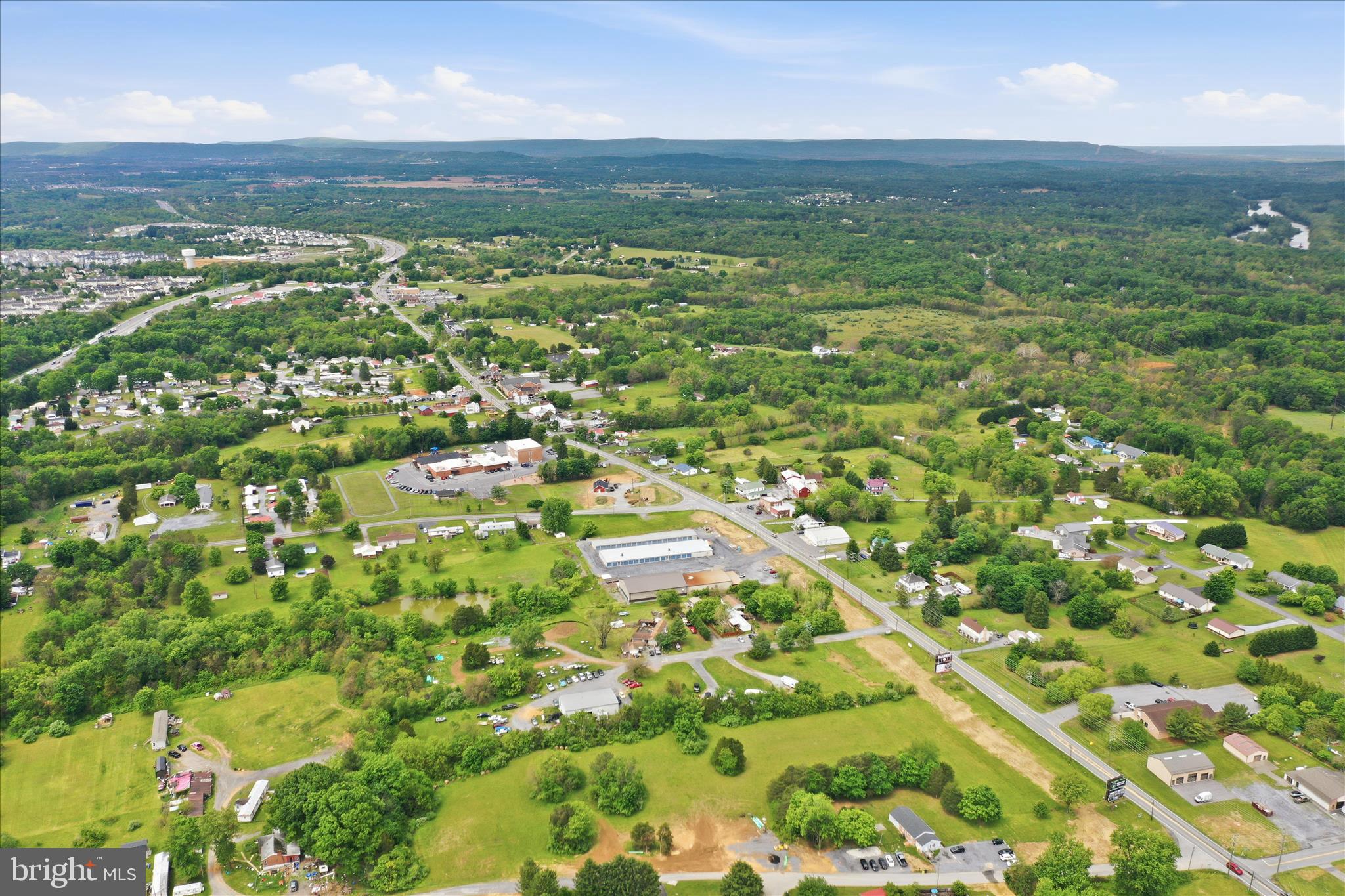 Williamsport Pike Falling Waters, WV 25419 - Photo 9 of 19 an aerial view of residential houses with outdoor space and trees
