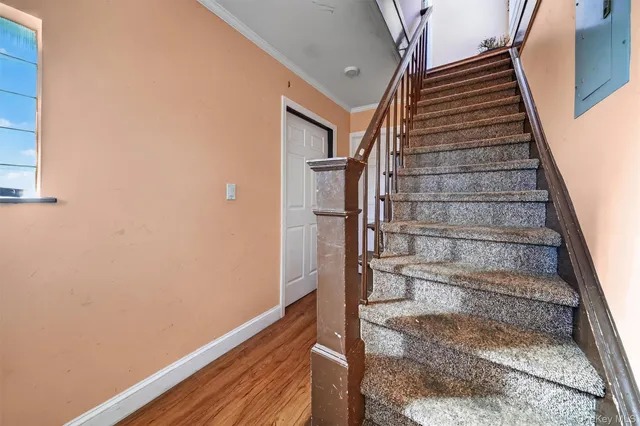a view of entryway with wooden floor