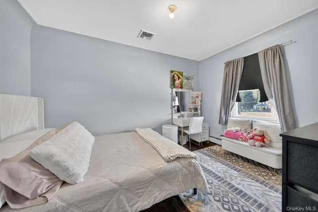 a large white kitchen with a large window