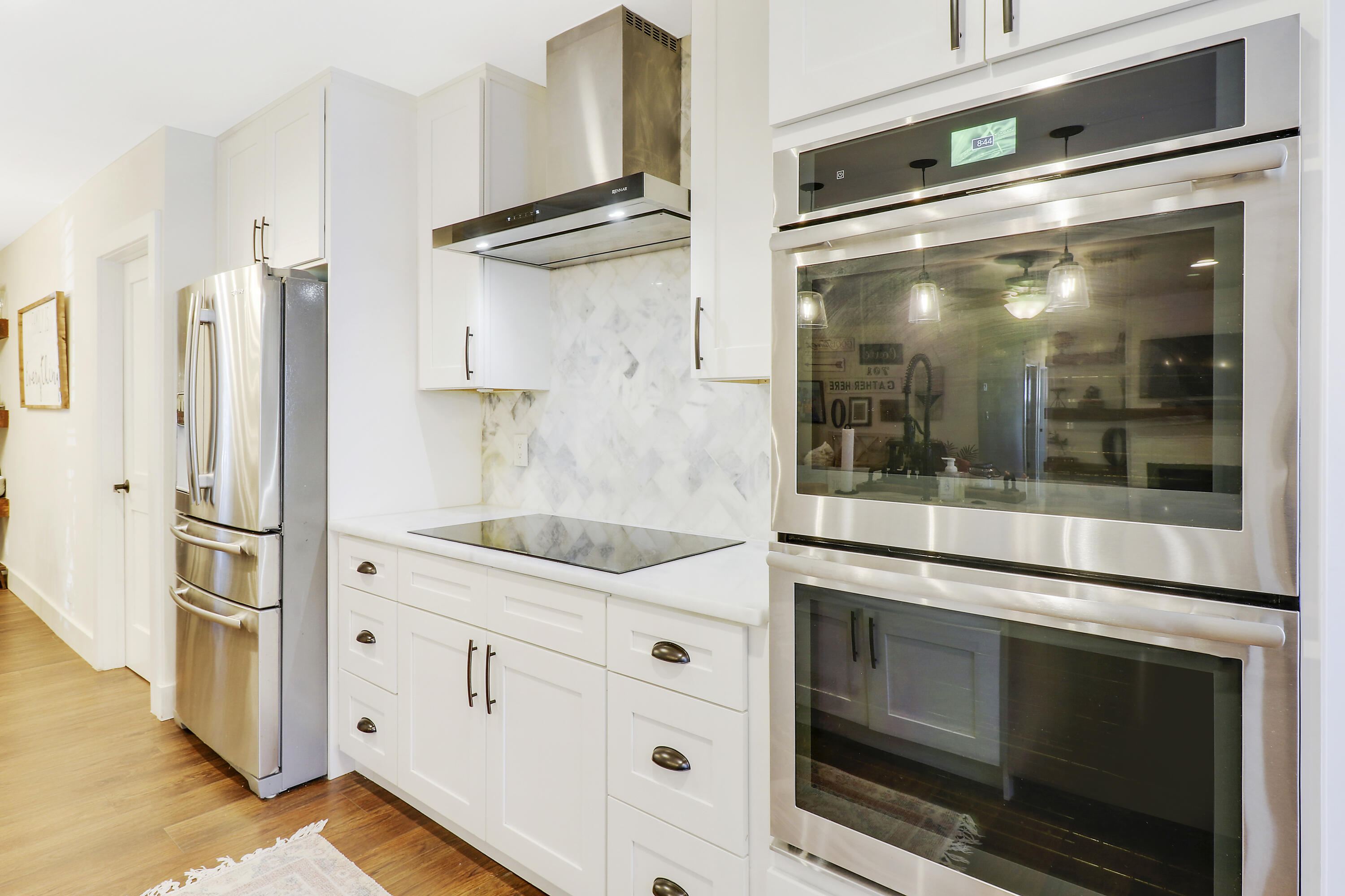 342 Country Club Drive Tequesta, FL 33469 - Photo 15 of 67 a kitchen with stainless steel appliances granite countertop a refrigerator and a stove