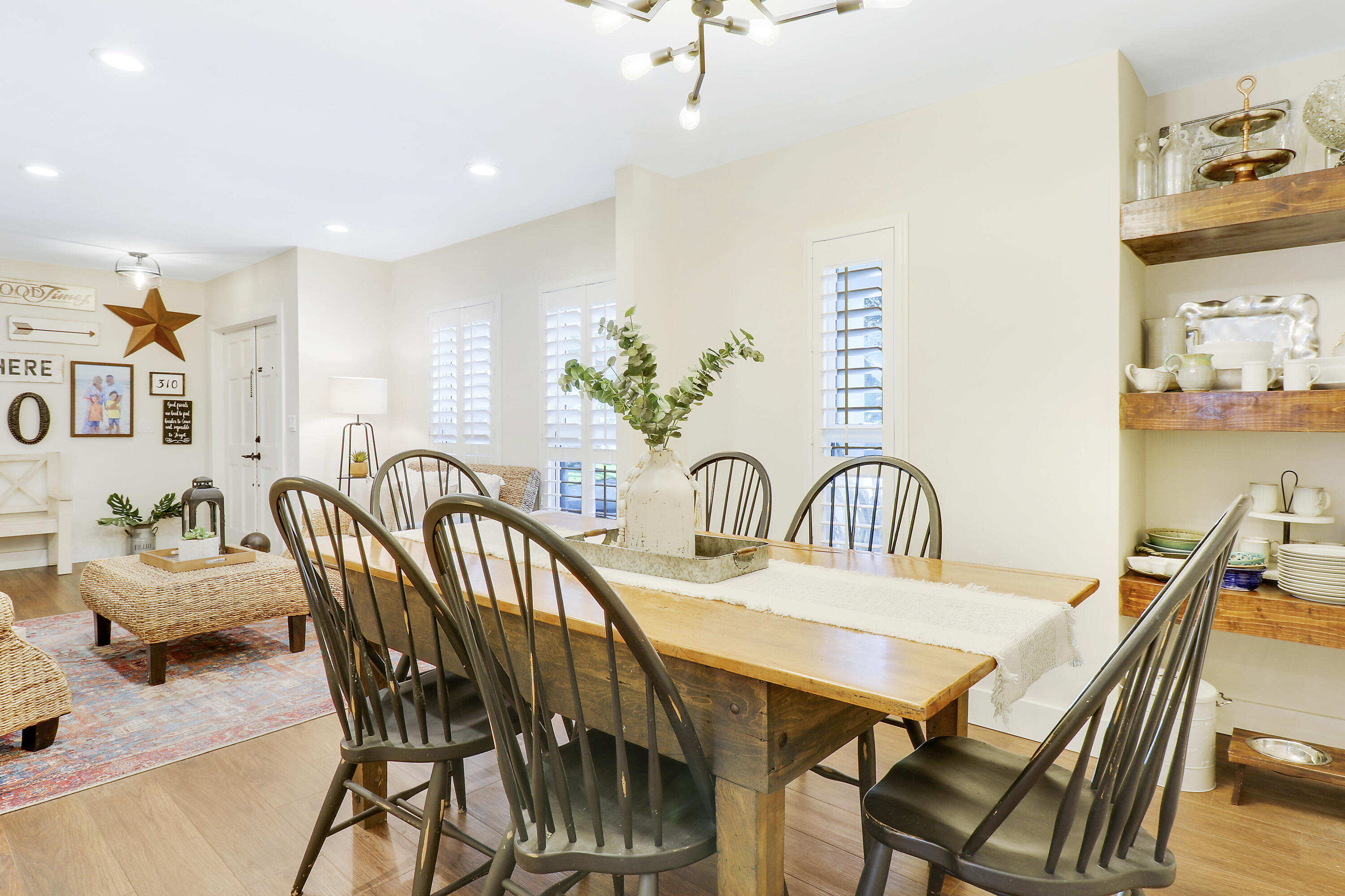 342 Country Club Drive Tequesta, FL 33469 - Photo 19 of 67 a view of a dining room with furniture and chandelier