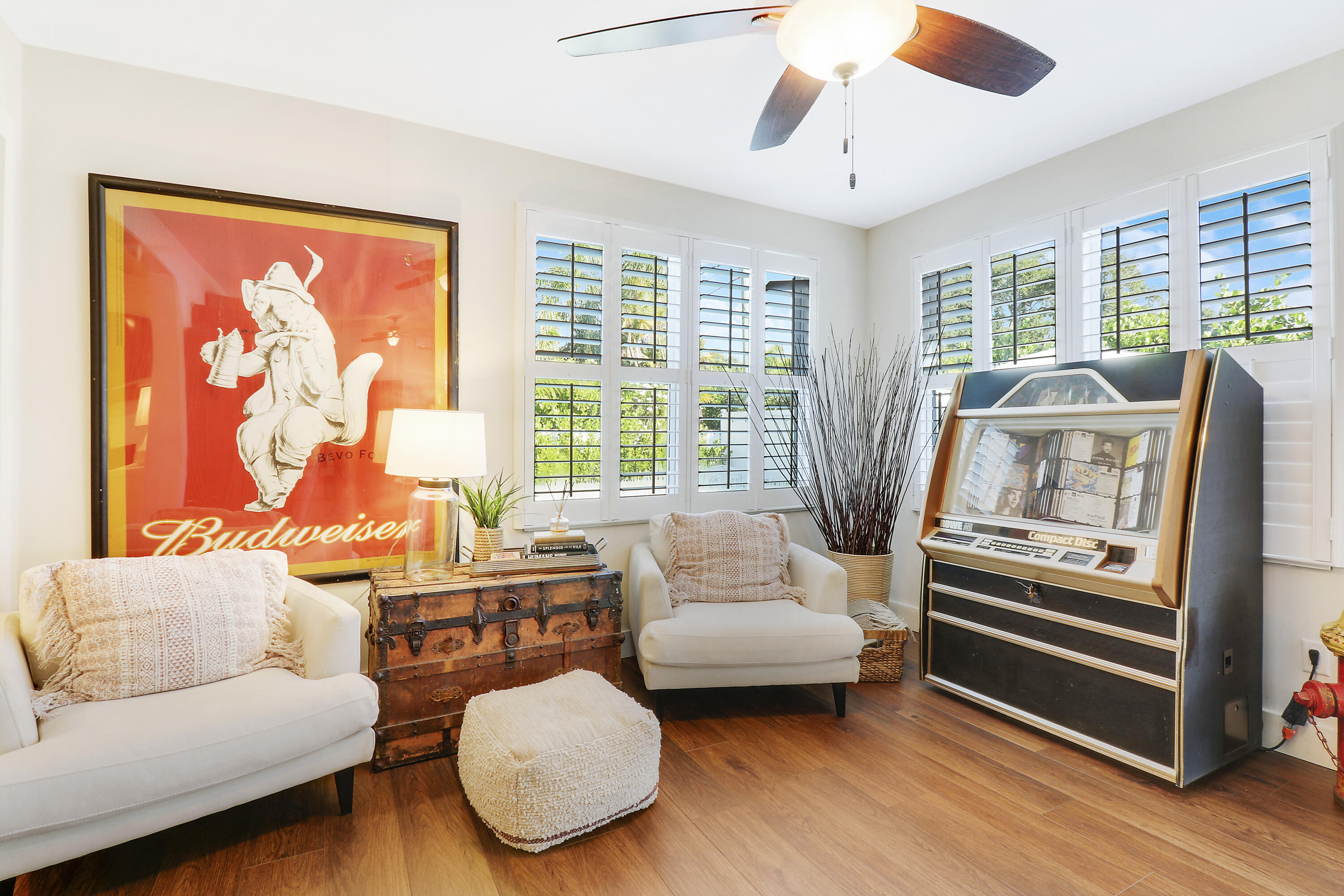 342 Country Club Drive Tequesta, FL 33469 - Photo 23 of 67 a living room with furniture and a large window