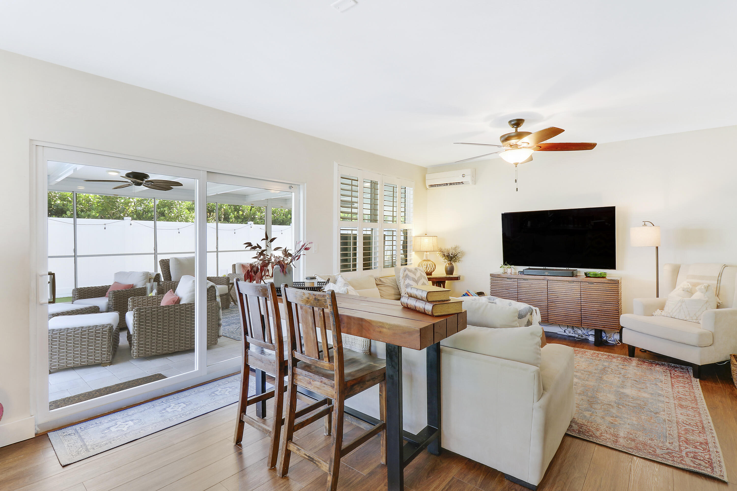 342 Country Club Drive Tequesta, FL 33469 - Photo 25 of 67 a view of a livingroom with furniture window and outside view