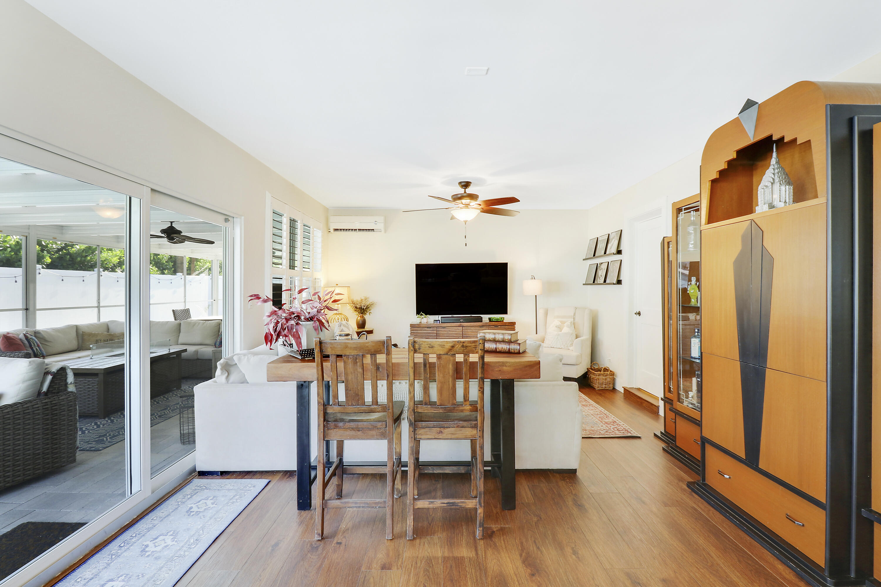 342 Country Club Drive Tequesta, FL 33469 - Photo 27 of 67 a living room with furniture and a flat screen tv
