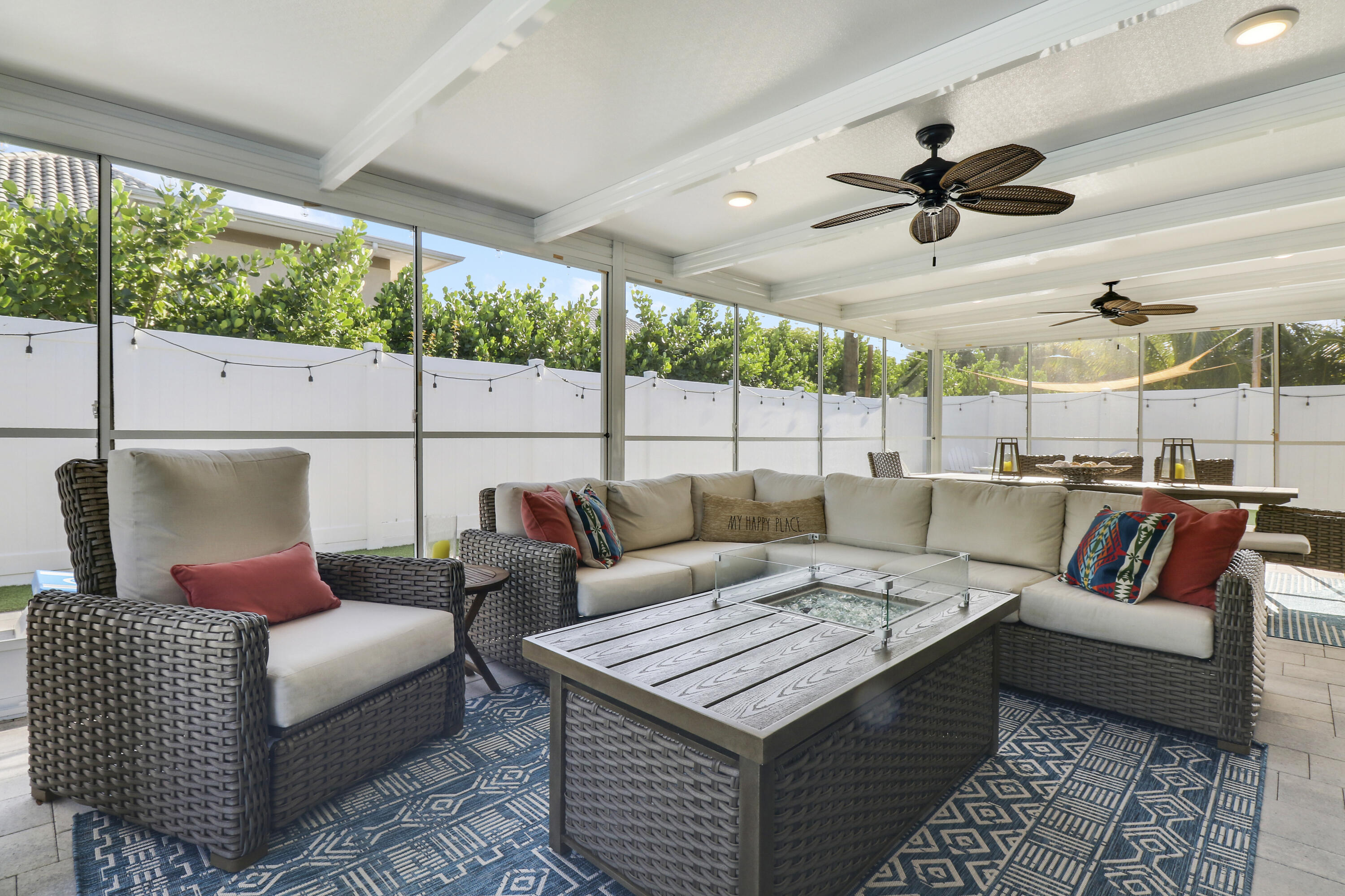 342 Country Club Drive Tequesta, FL 33469 - Photo 41 of 67 a living room with furniture and a large window