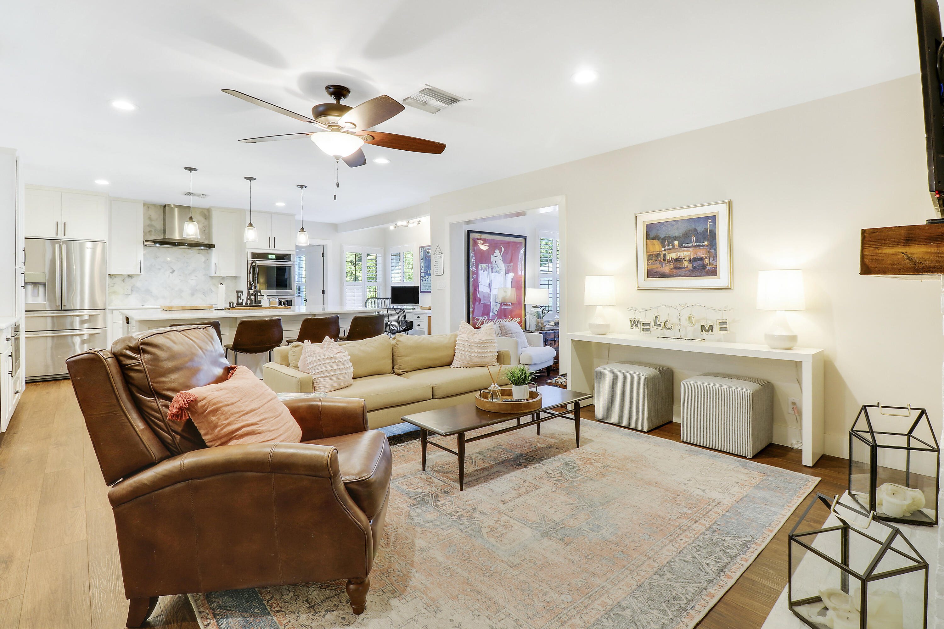342 Country Club Drive Tequesta, FL 33469 - Photo 67 of 67 a living room with furniture kitchen view and a window