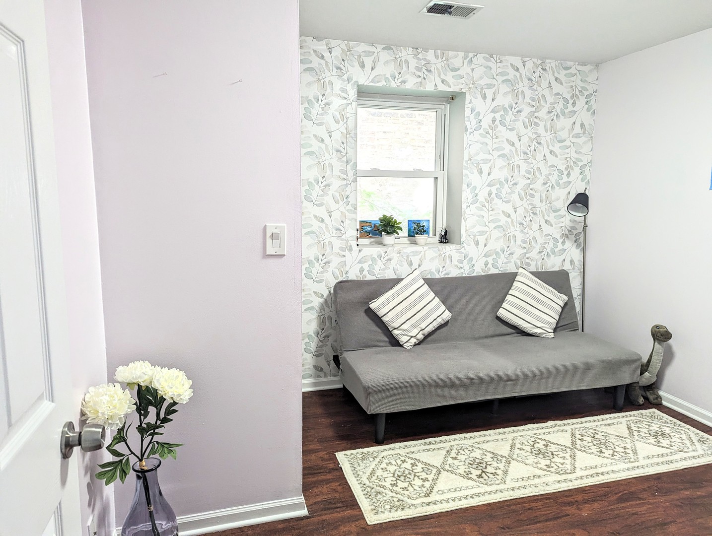 724 South Oakley Boulevard, Unit 1 Chicago, IL 60612 - Photo 20 of 22 a living room with furniture and a window