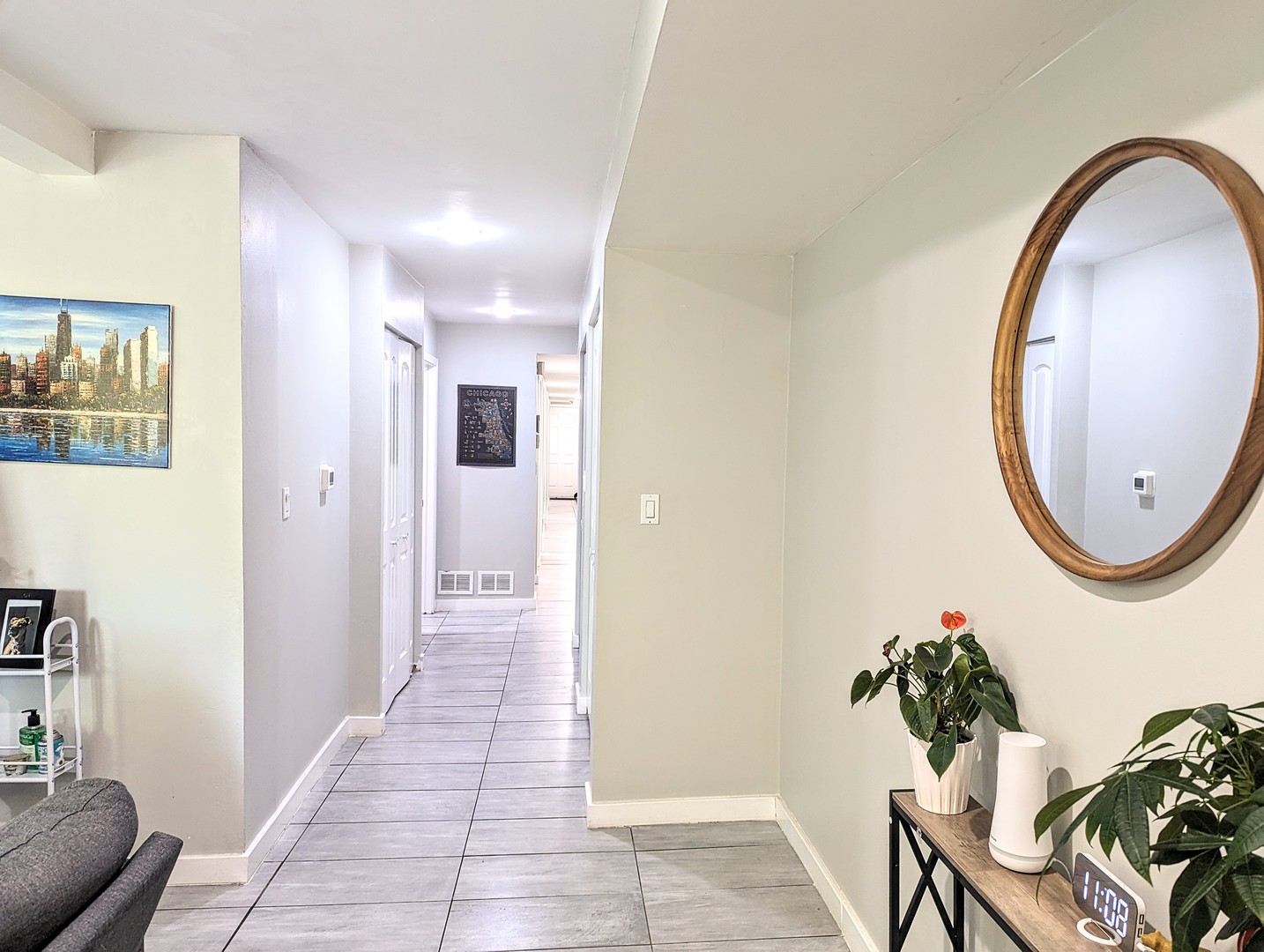 724 South Oakley Boulevard, Unit 1 Chicago, IL 60612 - Photo 7 of 22 a view of a hallway to a livingroom with furniture