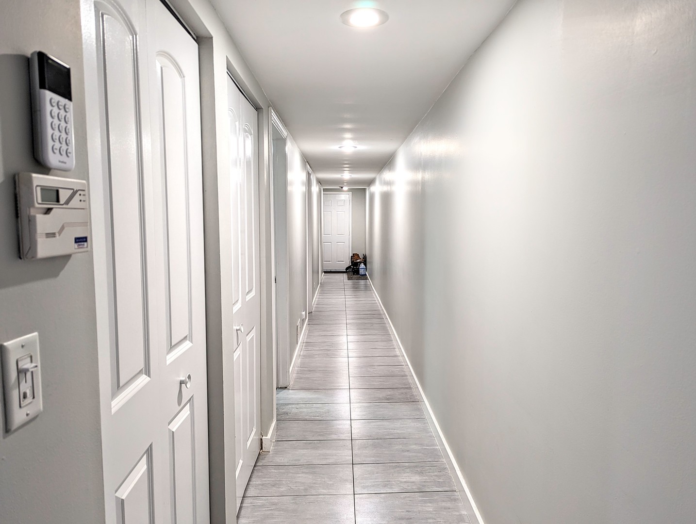 724 South Oakley Boulevard, Unit 1 Chicago, IL 60612 - Photo 9 of 22 a view of a hallway with wooden floor and staircase