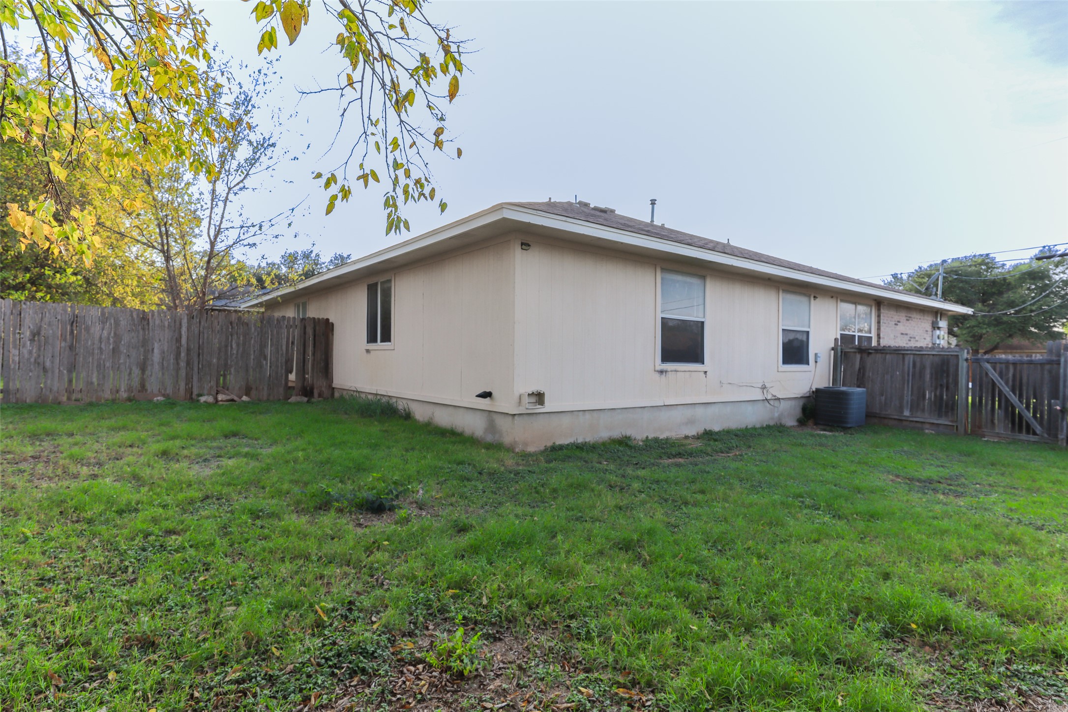 300 Tamara Drive, Unit A Georgetown, TX 78628 - Photo 12 of 12 a view of a house with a yard
