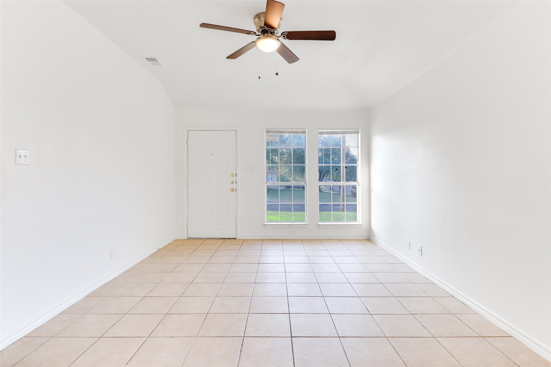 300 Tamara Drive, Unit A Georgetown, TX 78628 - Photo 4 of 12 a view of an empty room with a window