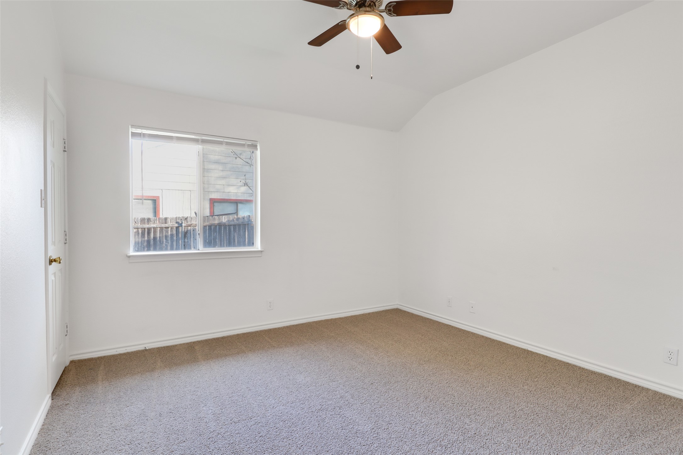300 Tamara Drive, Unit A Georgetown, TX 78628 - Photo 7 of 12 an empty room with a window